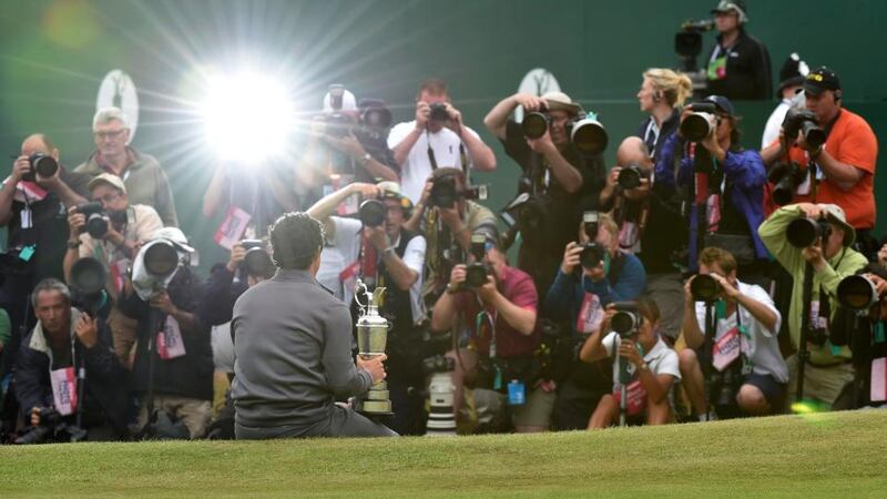 Rory McIlroy  poses with the Claret Jug after winning the British Open Championship at the Royal Liverpool Golf Club in Hoylake. Photograph: Reuters