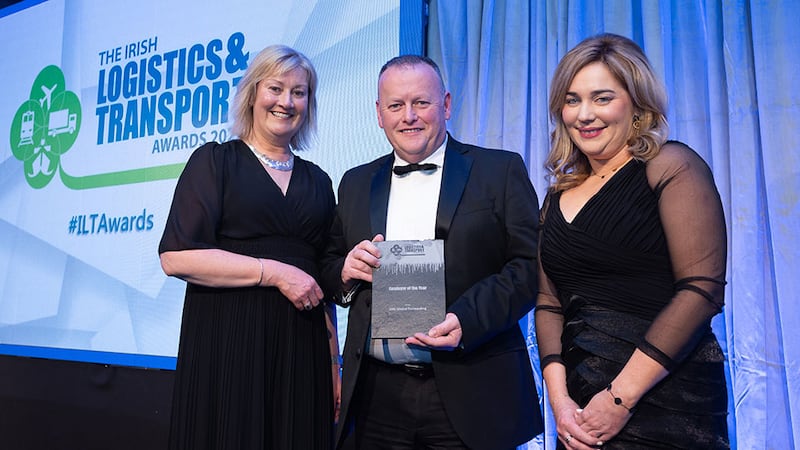 Gary OCarroll, Senior Consultant, Driving Force, presents the Employer of the Year award to Hilda Hegarty and Blanaid Meade, DHL Global Forwarding.