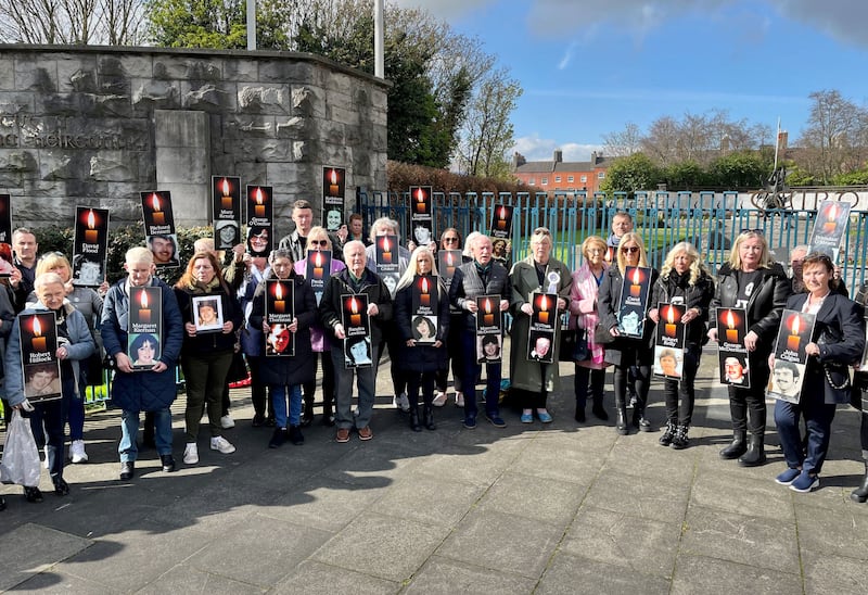 Relatives of those killed in the Stardust fire gather at the Garden of Remembrance in Dublin ahead of the first day of the inquest. Photo: PA 