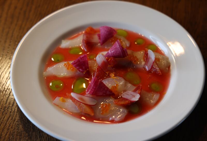 Wild sea bass crudo, blood orange and rosemary