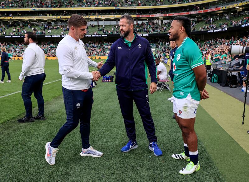 Ireland head coach Andy Farrell with his son Owen and Manu Tuilagi after Saturday's game. Photograph: Dan Sheridan/Inpho