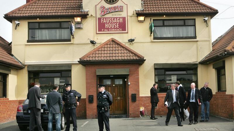 Gardaí attend the scene of the murder of gang leader Eamon Dunne in the Fassaugh House pub in Cabra, north Dublin, in April 2010. Photograph : Matt Kavanagh