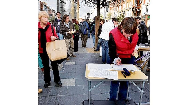 Campaigning for cervical cancer checks in Dublin: the average cost of cervical checks per woman screened in the UK is €45.95 (£41) compared to the average cost per woman screened in Ireland of €144.