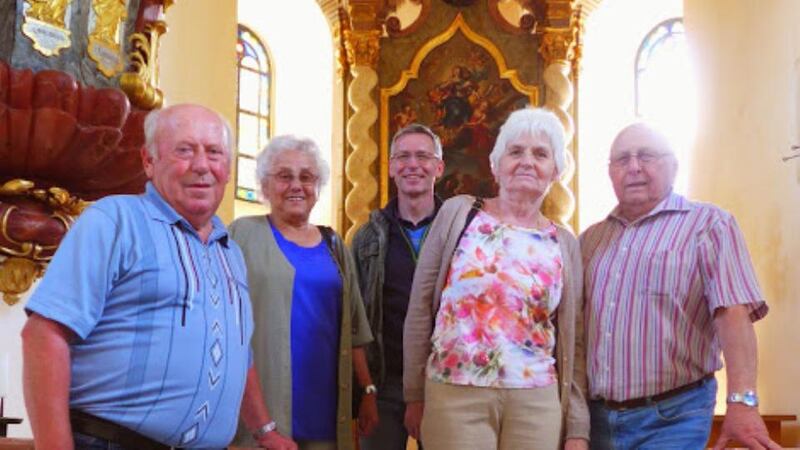 Helmut, Else Sandner, Thomas and Meta Tauer and Franz Sandner in the restored Sudetenland church where Helmut and Franz were baptised. Photograph: Derek Scally