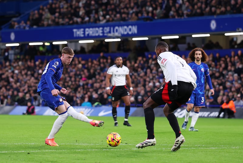 Cole Palmer of Chelsea scores his team's first goal during the Premier League match against Fulham. Photograph: Ryan Pierse/Getty