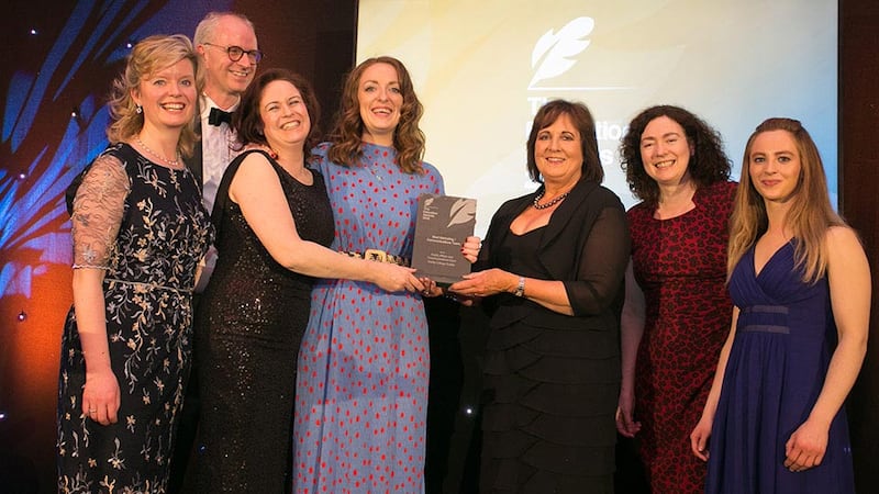 Jane O'Keefe, JC & Director of Supply Chain, NMCI/CIT presents Best Marketing / Communications Team Award to Trinity College Dublin Team.