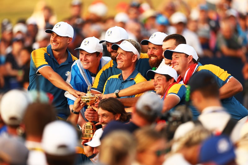 Team Europe Captain Luke Donald lifts the trophy with his team after the 2023 Ryder Cup victory at Marco Simone GC in Rome, Italy. Photograph: Naomi Baker/Getty Images