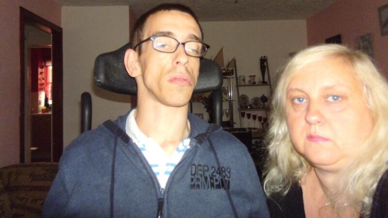 Gordon Colgan with his mother, Julia Kliszcz. Mr Colgan lives on disability benefits, while his mother gets about £120 a week, including a £59.75 carer’s allowance.