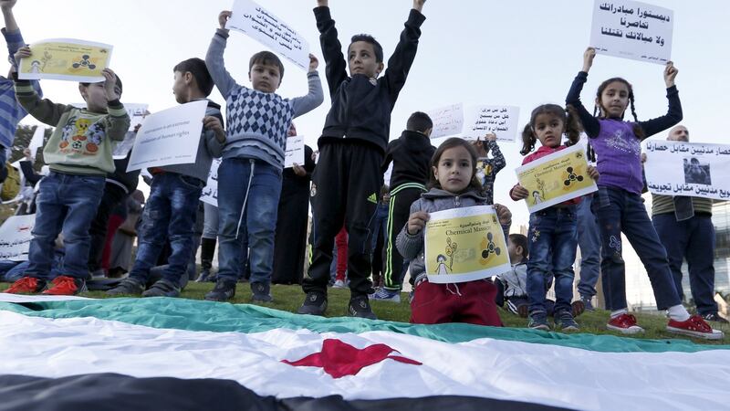 Syrian children carry placards as they call for the lifting of the siege off Madaya and Zabadani towns during a protest outside the offices of the UN in Beirut, Lebanon. Photograph: Jamal Saidi/Reuters.