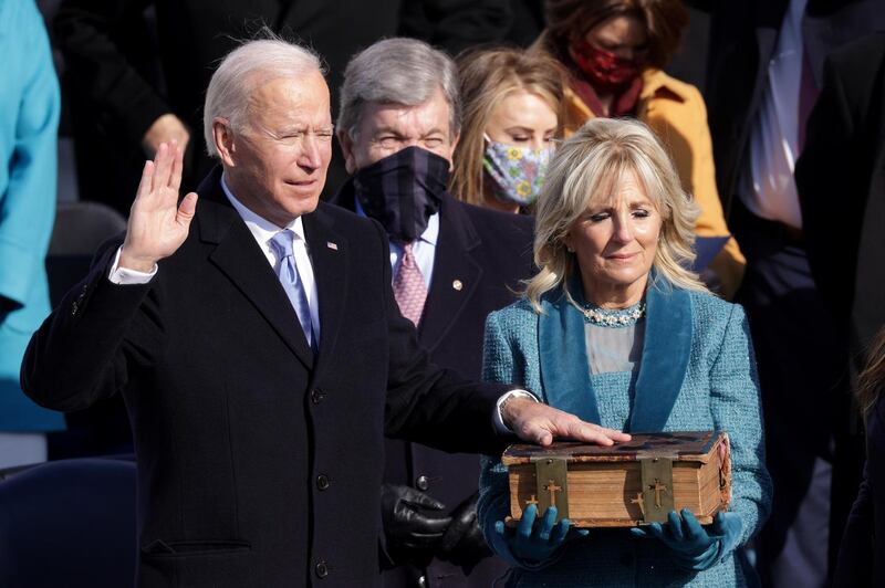 Joe Biden is sworn in as the 46th  US president alongside his wife, DR Jill Biden. Photograph: Alex Wong/Getty