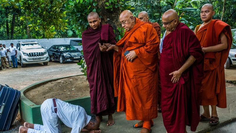 A Sri Lankan Buddhist bows in front of Sitagu Sayadaw, one of Myanmar’s most revered Buddhist leaders, in Delgoda, Sri Lanka. Photograph: Minzayar Oo/The New York Times