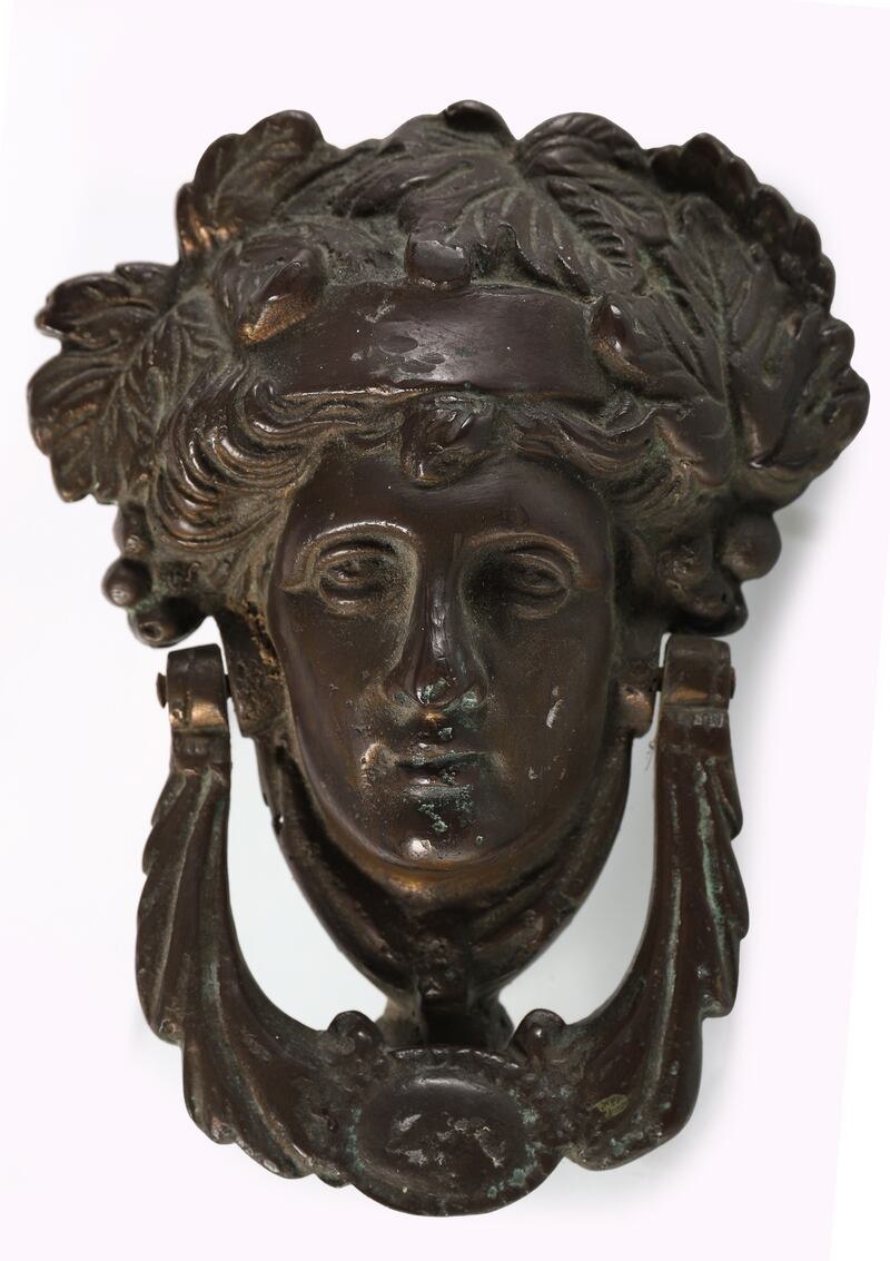 The 18th-century brass knocker (€150-€250) at Sheppard's auction