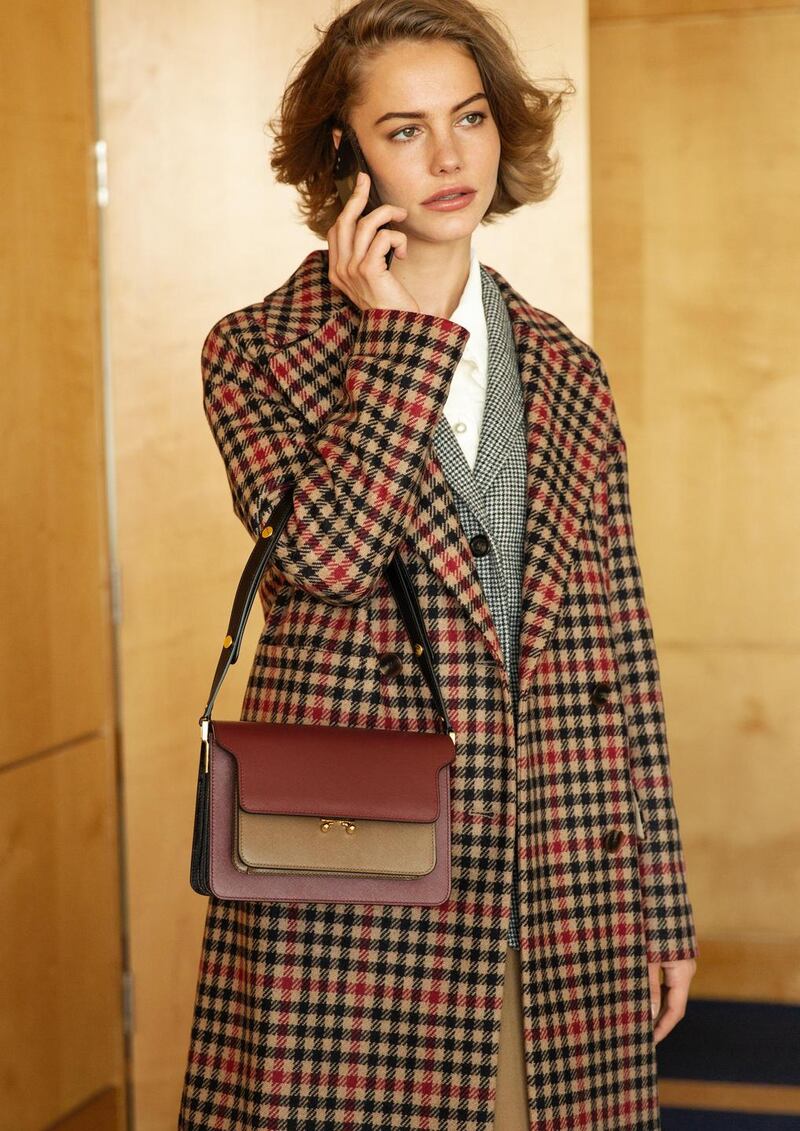 Camel check coat €545 Hugo Boss, grey check blazer €485 MaxMara, cream frilled blouse €425 Edward Achour Paris, burgundy bag €1,490 Marni, camel skirt €250 See by Chloe, all from Brown Thomas