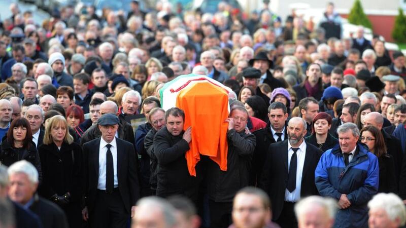 The remains of former Kerry South TD Jackie Healy-Rae are carried through Kilgarvan village following his funeral mass at Patrick’s Church, Kilgarvan, Co Kerry in December 2014. Photograph: Eamonn Keogh/MacMonagle, Killarney