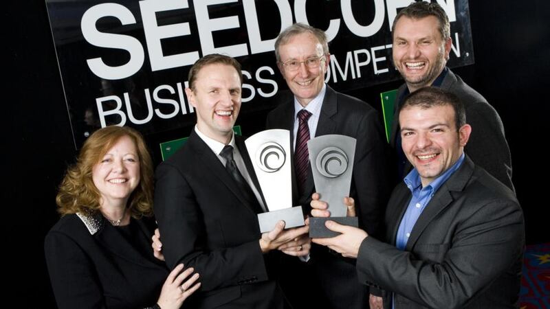 From left: Rose Mary Stalker and Andrew Woods of Belfast firm Catagen, named best high-growth company in the 10th InterTradeIreland Seedcorn business competition; Martin Cronin  of InterTradeIreland; and  Seamus Porter and Antonio Ruzelli of Dublin company Wattics, named best emerging company.  Photograph: Darryl Mooney