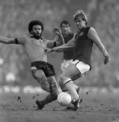 Aston Villa's Gary Shaw and his shin pads are challenged by Wolves' George Berry during a game in 1981. Photograph:  Mark Leech/Getty Images