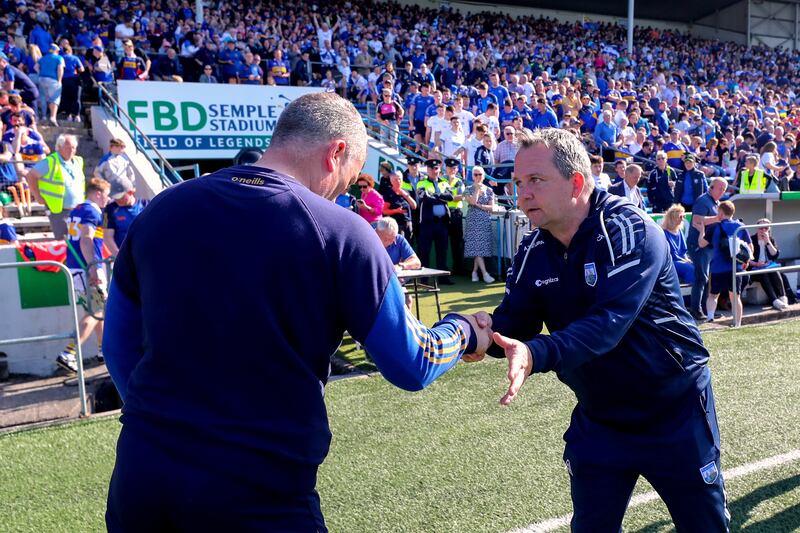 Waterford manager Davy Fitzgerald and Tipperary manager Liam Cahill shake hands after the game. Photograph: Bryan Keane/Inpho