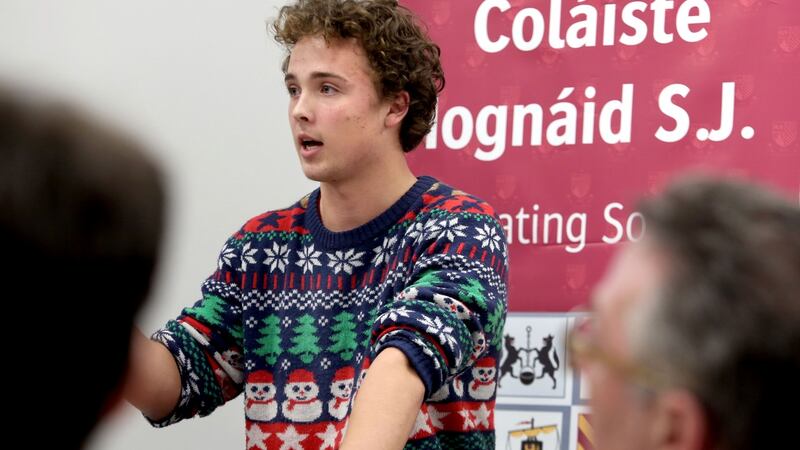 Liam Carton, a sixth-year student, speaks during a debate at Coláiste Iognáid annual Christmas debate. Photograph: Joe O’Shaughnessy