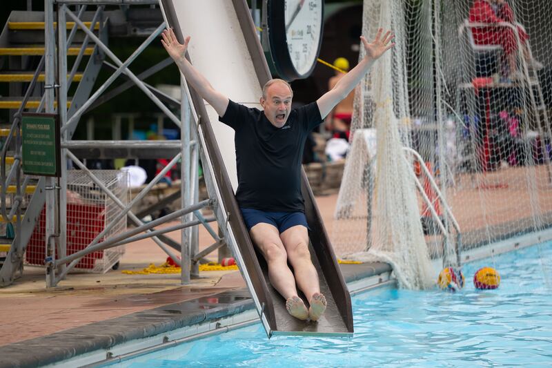 A sliding descent at Sandford Parks Lido in Cheltenham ahead of a water aerobics class. Photograph: Matthew Horwood/Getty Images