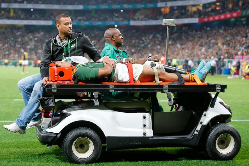 South Africa's wing Kurt-Lee Arendse was both shown red and stretchered off the park following his involvement in a dangerous aerial collision with Beaden Barrett. Photograph: Phill Magakoe/AFP via Getty Images 