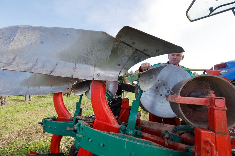 Wexford's John Whelan, current World Champion in the Senior Reversable ploughing competition, preparing to defend his title on day three. Photograph: Alan Betson/The Irish Times