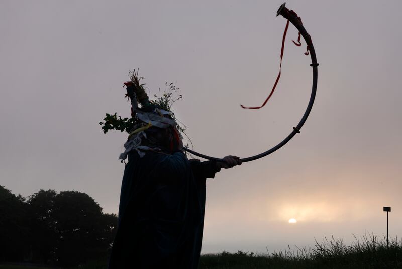 The Loughnashade trumpet player at sunrise on Wednesday. Photograph: Alan Betson/The Irish Times

