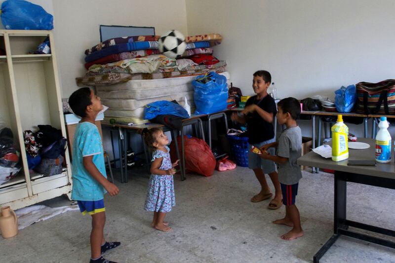 Children from Beit Leef village play football in a classroom of a school where displaced Lebanese families from villages near the southern border took refuge in Tyre city, on October 19th. Photograph: Mahmoud Zayyat/Getty Images