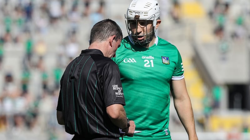 Referee Paud O’Dwyer speaks to Aaron Gillane. Photo: Lorraine O’Sullivan/Inpho