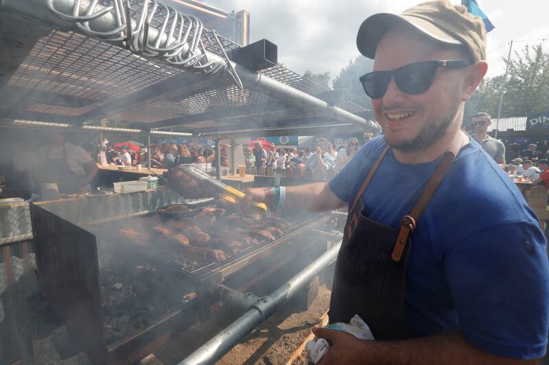 Chef Phill Branch cooks steak at the Hawksmoor Stall during last summer's Big Grill BBQ and Food Festival, which returns to Herbert Park in Dublin from August 22nd-25th. Photograph: Alan Betson