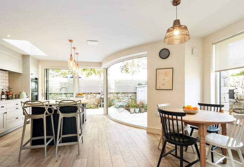 Curved glass in the kitchen area adds both interest and light