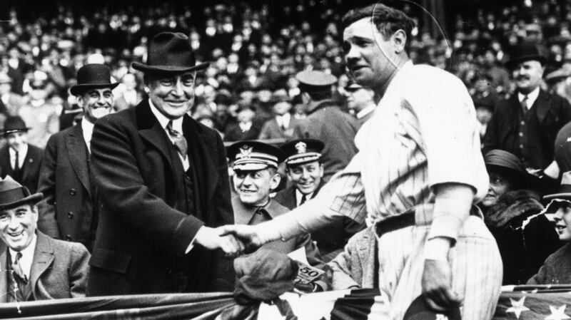 US president Warren G Harding shakes hands with Babe Ruth ahead of the third game of the 1923 World Series. Photograph:Keystone/Getty Images