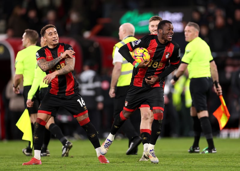 Dango Ouattara of Bournemouth celebrates with team-mates and with the match ball after his hat-trick in the Premier League win over Nottingham Forest at Vitality Stadium. Photograph: Warren Little/Getty Images