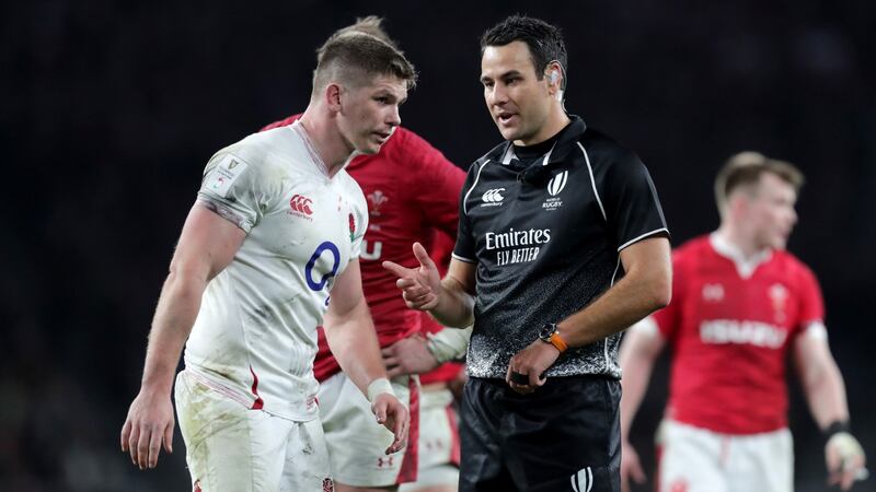 Referee Ben O’Keeffe talks to England captain Owen Farrell during the game at Twickenham. Photograph: Laszlo Geczo/Inpho