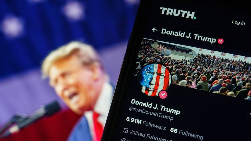 A phone displays US president Donald Trump's account on social media platform Truth Social. Photograph: Will Oliver/EPA