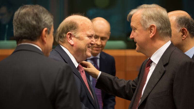 Minister for Finance Michael Noonan  with EU Commissioner for Economic and Monetary Affairs, Olli Rehn. Photograph:  Peter Cavanagh