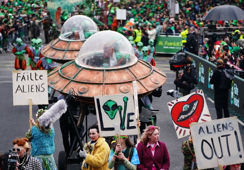 Performers make their way across O'Connell Bridge. Photograph: Brian Lawless/PA Wire