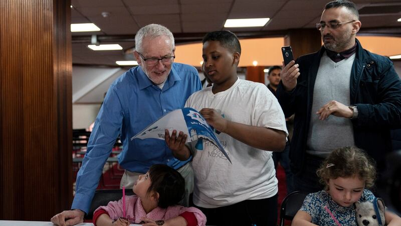 British Labour Party leader Jeremy Corbyn (left) visits Finsbury Park Mosque in London on Visit My Mosque Day on Sunday. He was hit on the head with an egg during the visit. Photograph: Will Oliver/EPA