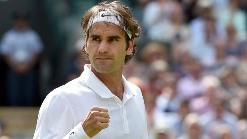 Roger Federer  reacts after defeatingTommy Robredo of Spain in their men’s singles   at   Wimbledon. Photograph: Toby Melville/Reuters