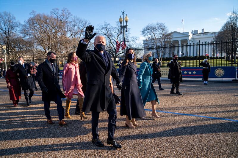 US president Joe Biden and first lady Dr Jill Biden walk along Pennsylvania Avenue with their family in front of the White House on Wednesday. Photograph: Doug Mills/EPA/Pool