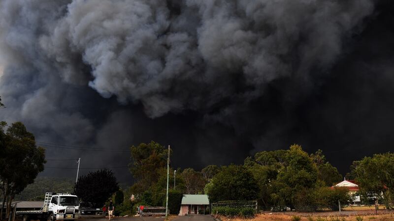 Smoke from bushfires rises into the air near Sydney, New South Wales. Temperatures above 40 degrees  and strong winds are fanning a number of fires around Sydney. Photograph: EPA