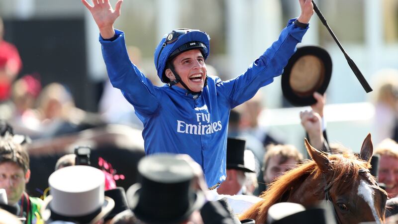 William Buick celebrates Masar’s Epsom Derby victory. Photograph: David Davies/PA