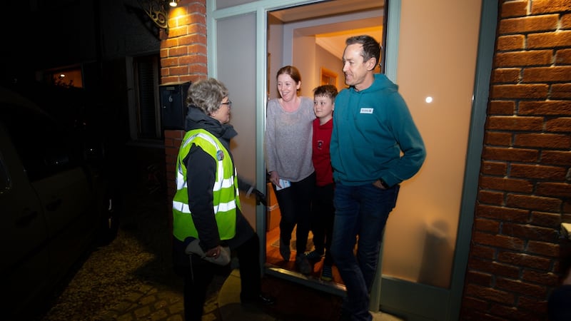 Minister for Children and Youth Affairs Katherine Zappone chatting with Mark and Aishling McBride and their son Cian aged 12 in Rathfarnham, Dublin. Photograph: Tom Honan for The Irish Times