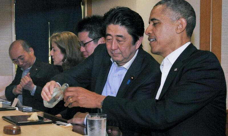 Shinzo Abe and Barack Obama at the restaurant where the then US president said he had the best sushi of his life. Photograph: Cabinet Public Relations Office/AFP via Getty Images