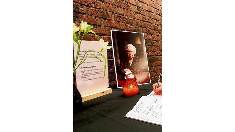 A recent photo of Gies and the register of condolence at the Anne Frank House, Amsterdam. Photograph: Anne Frank House/AP