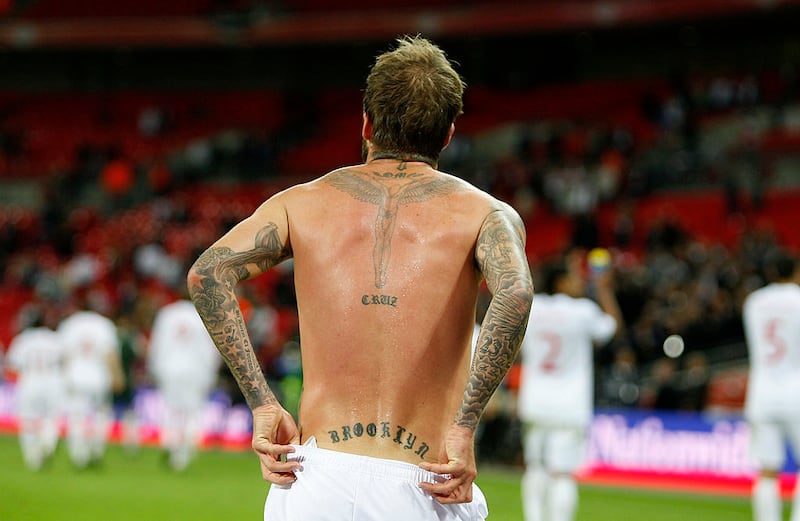 David Beckham’s angel, by Louis Molloy, surrounded by the names of his children. Photograph: Ian Kington/AFP/Getty Images