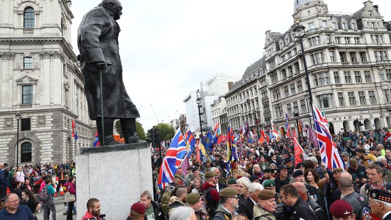 Demonstrators gather in Parliament Square, London, as part of a protest against the prosecution of one of the soldiers involved in the Bloody Sunday massacre. Photograph: Aaron Chown/PA Wire