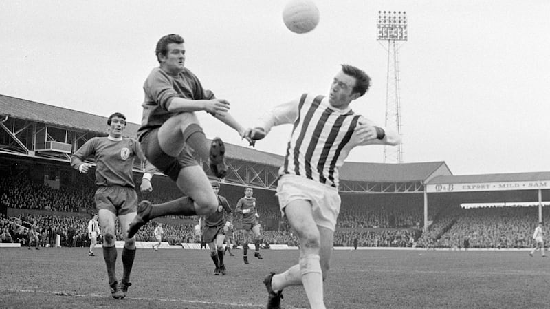 West Bromwich Albion centre-forward Jeff Astle  challenging for a high ball with Liverpool goalkeeper Tommy Lawrence in 1968. The brains of former footballers should be donated for research to allow studies into the health effects of heading the ball, the daughter of Mr Astle said.  Photograph: PA Wire