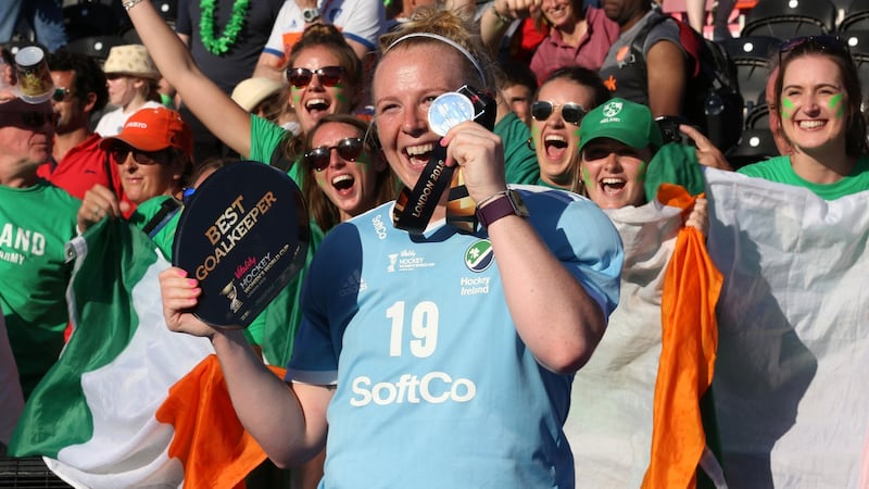 Ayeisha McFerran celebrates with her silver medal and best goalkeeper of the tournament trophy following the 2018 World Cup final against the Netherlands. Photograph: Kate McShane/Getty Images