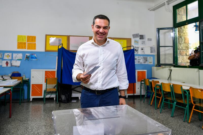 Alexis Tsipras, head of the left-wing Syriza party, votes at a polling station in Athens. Photograph: Michael Varaklas/AP