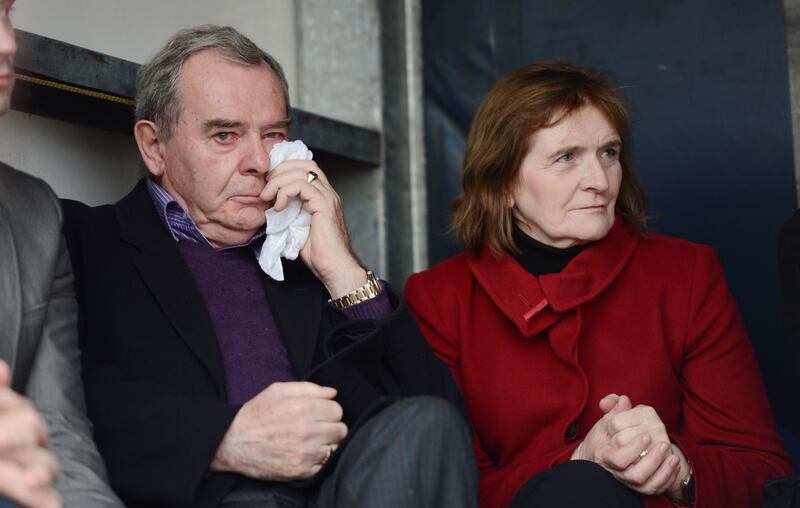 Tears roll down the face of Seán Quinn, with his wife Patricia, as his daughter Ciara speaks on behalf of the family at a 2012 rally to show support for the Quinn family, attended by up to 10,000 people in Ballyconnell, Co Cavan. Photograph: Alan Betson 
 